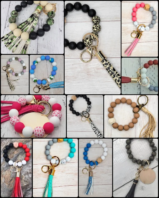 Beaded Silicone or Wood Wristlet / Keychain with Tassels or Wood Circle Iconic Fashion Bags At Unbeatable Savings