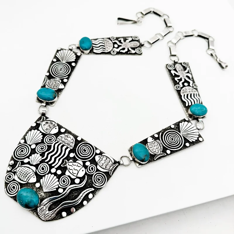 Elevate Your Outfit With Discounted Statement Jewelry Alex Sanchez "Under the Sea" Petroglyph Necklace